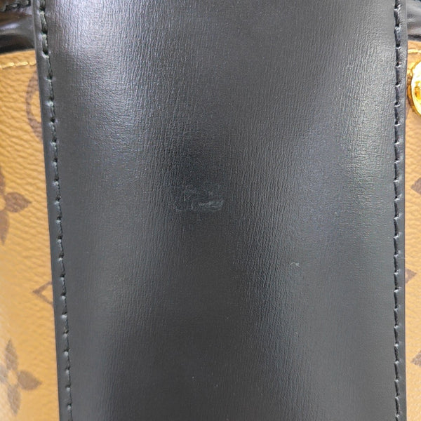 CANNES PM Monogram Coated Canvas Brown