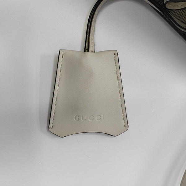 Padlock Small Monogram Coated Canvas Beige