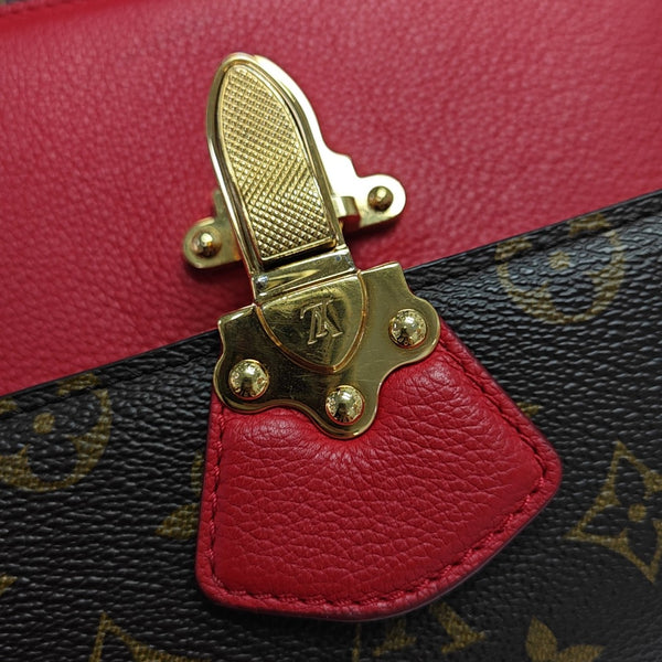 VICTOIRE Monogram Coated Canvas Brown