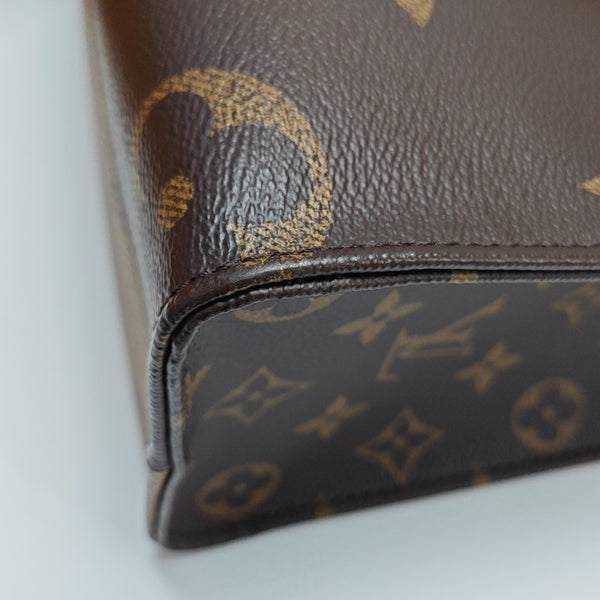 ONTHEGO PM Monogram Coated Canvas Brown