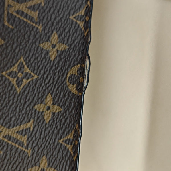 TRUNK Monogram Coated Canvas Brown