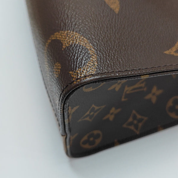 ONTHEGO PM Monogram Coated Canvas Brown