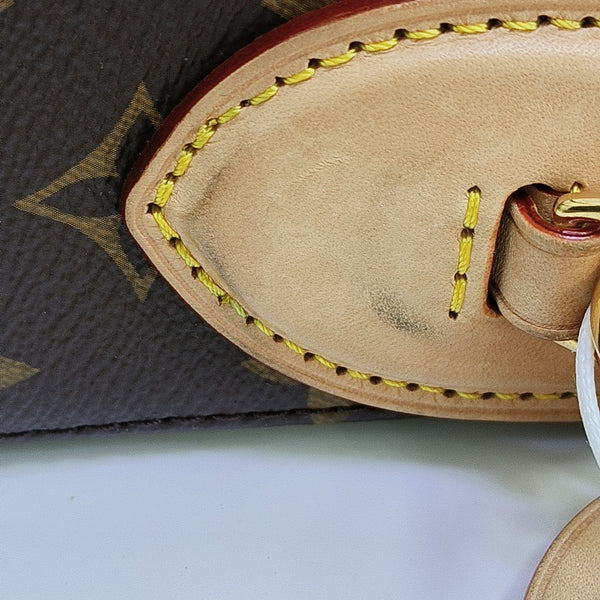 SLOUCHY PM Monogram Coated Canvas Brown