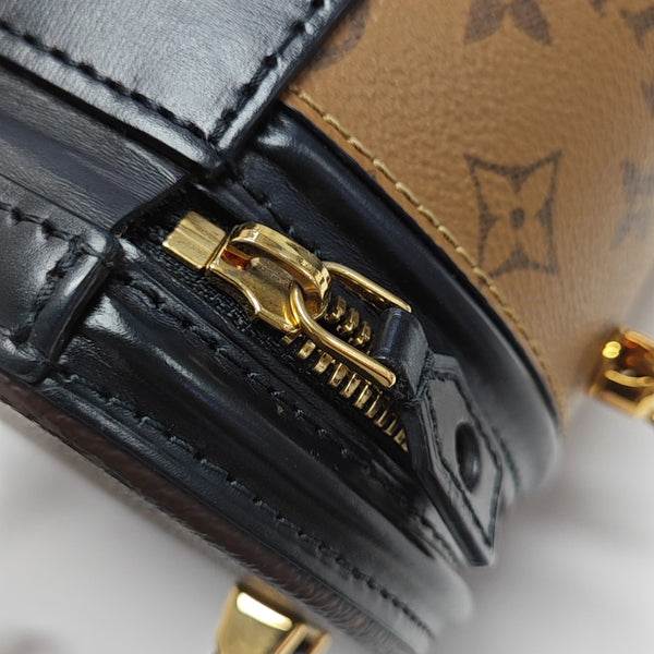 CANNES PM Monogram Coated Canvas Brown
