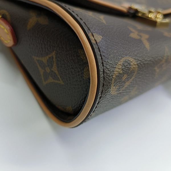 Pochette Camille Monogram Coated Canvas Brown
