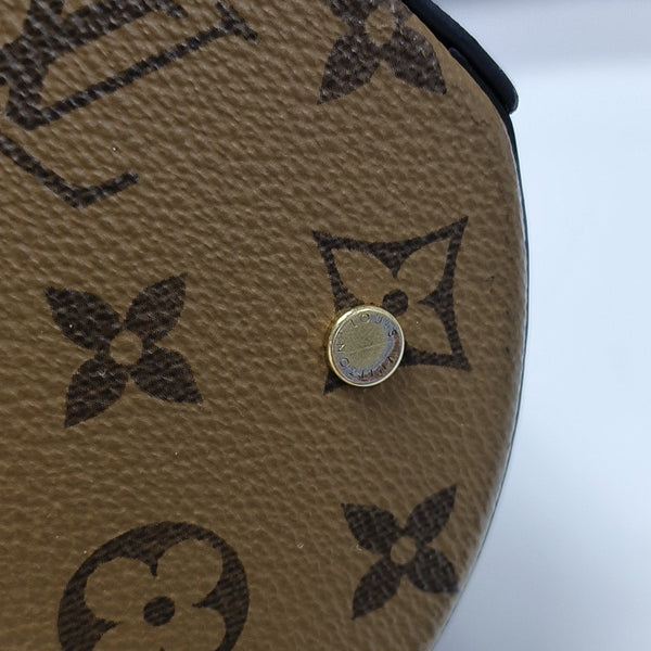 CANNES PM Monogram Coated Canvas Brown