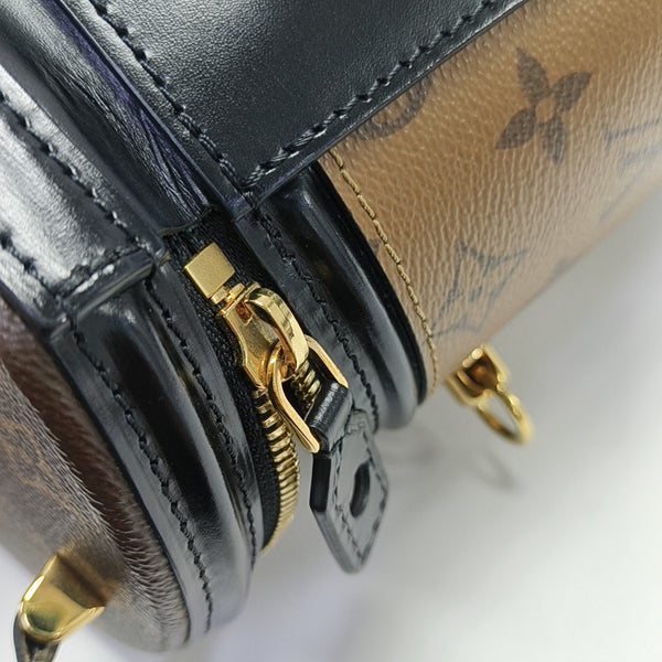 CANNES PM Monogram Coated Canvas Brown