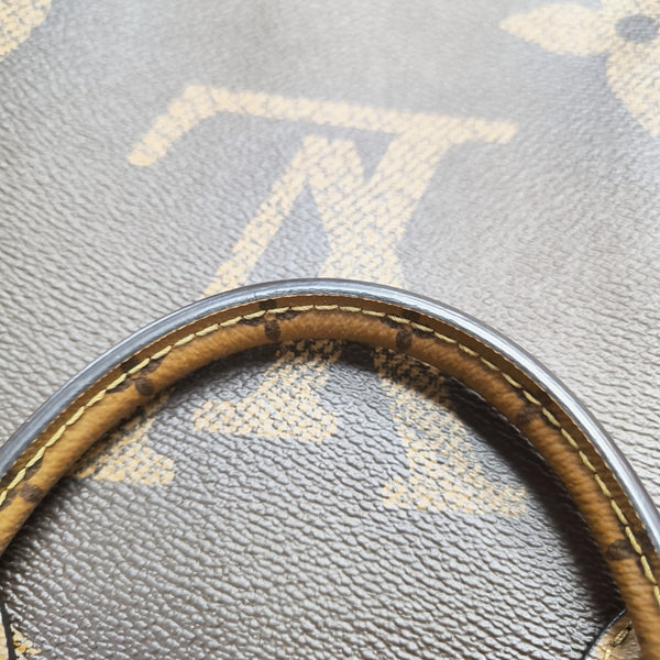 ONTHEGO MM Monogram Coated Canvas Brown