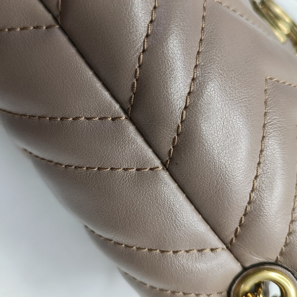 Authenticated pre-owned GG Marmont Mini Quilted Calfskin Beige - Bucket Bag at Looply