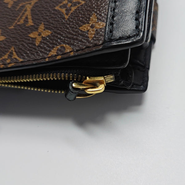 TRUNK Monogram Coated Canvas Brown