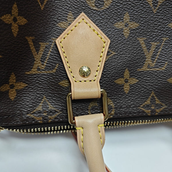 SPEEDY 25 Monogram Coated Canvas Brown
