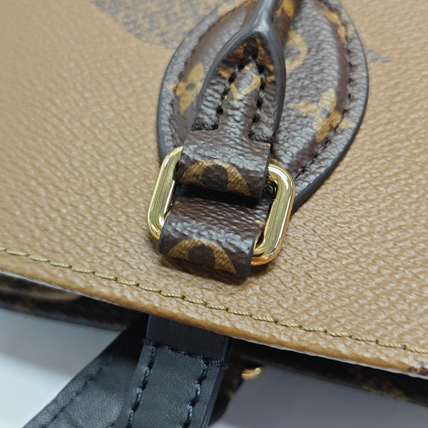 ONTHEGO MM Monogram Coated Canvas Brown