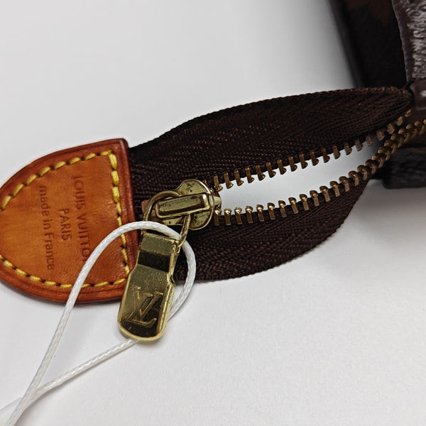 TOILET POCKET 26 Monogram Coated Canvas Brown