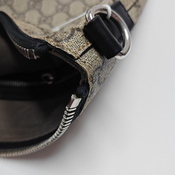 Monogram Coated Canvas Clutch Brown