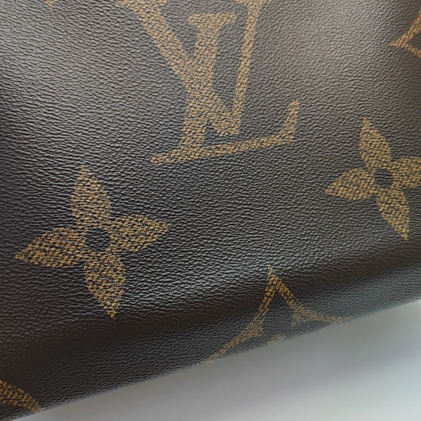 ONTHEGO MM Monogram Coated Canvas Brown