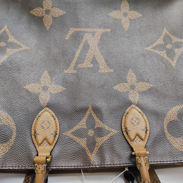 ONTHEGO GM Monogram Coated Canvas Brown