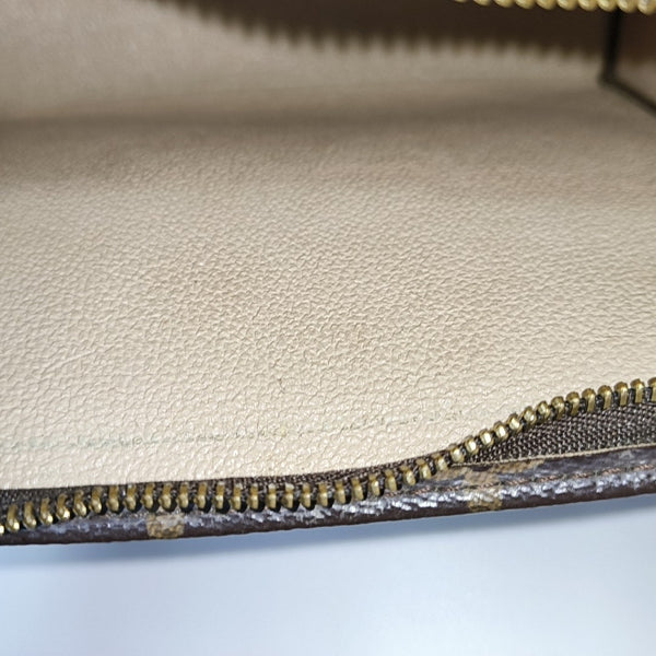 TOILET POCKET 19 Monogram Coated Canvas Brown