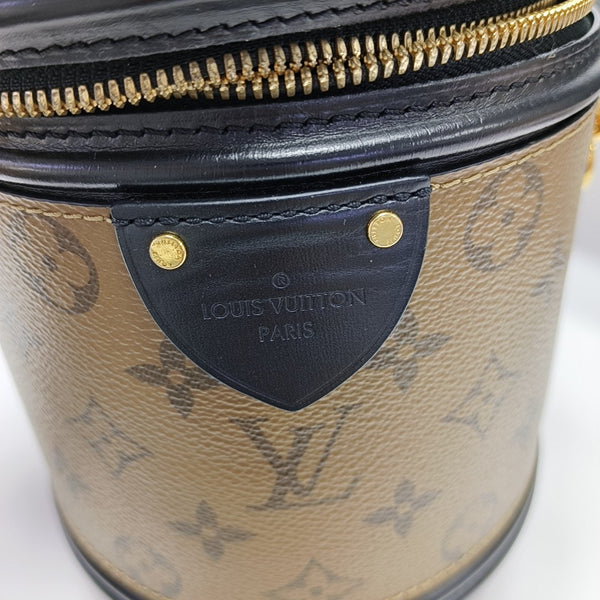 CANNES PM Monogram Coated Canvas Brown