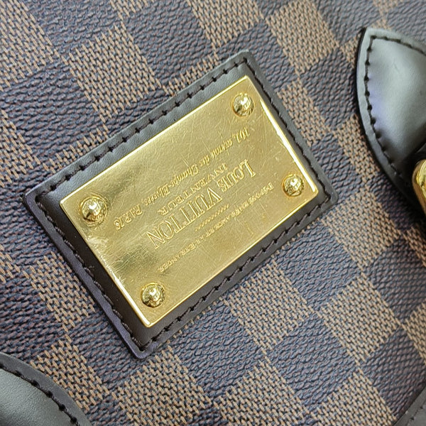 HAMPSTEAD PM Damier Ebene Coated Canvas Brown