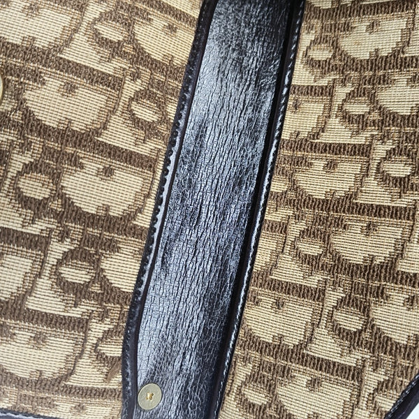 Oblique Canvas Clutch Brown