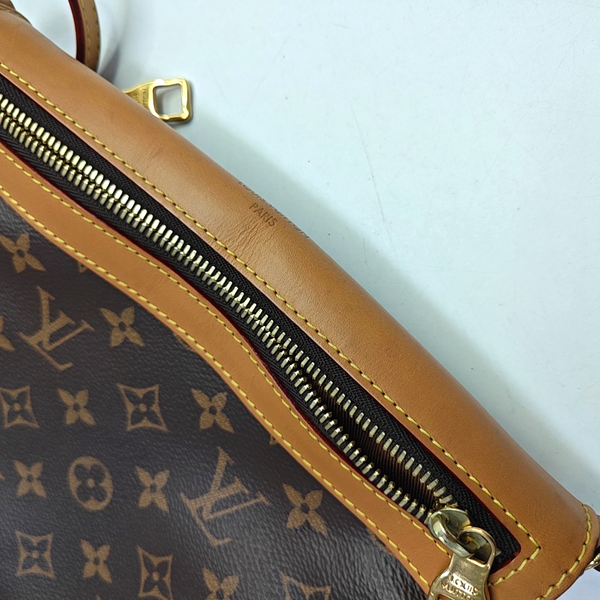 SAUMUR PM Monogram Coated Canvas Brown
