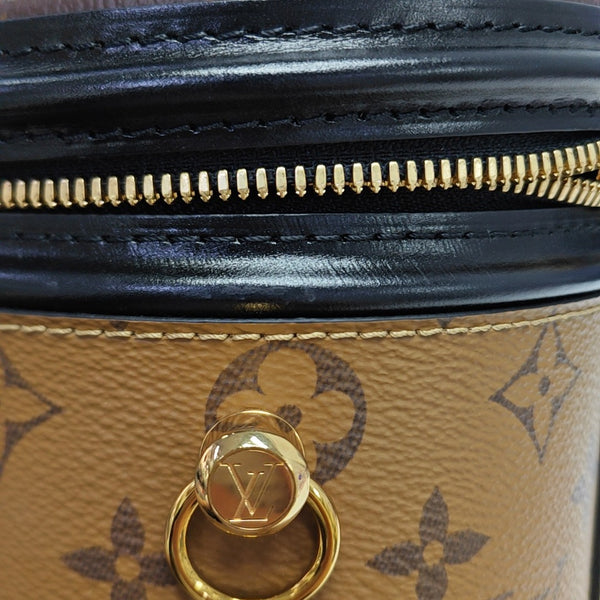 CANNES PM Monogram Coated Canvas Brown