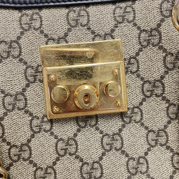 Padlock Small Monogram Coated Canvas Beige