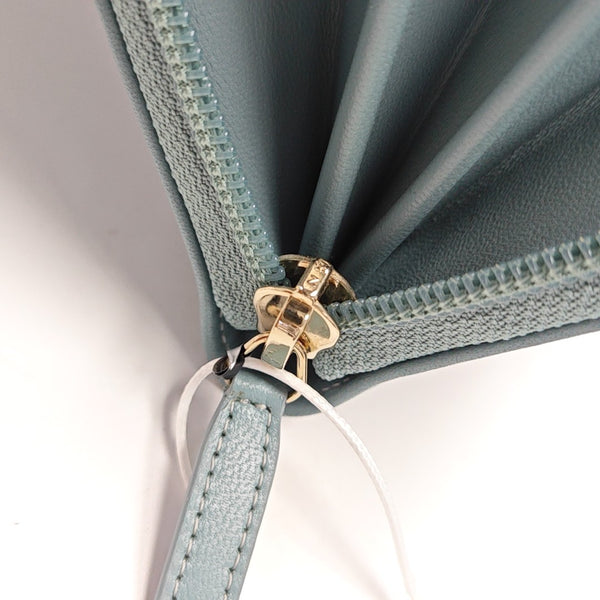 Authenticated pre-owned BOY CHANEL Quilted Lambskin Blue - Clutch at Looply