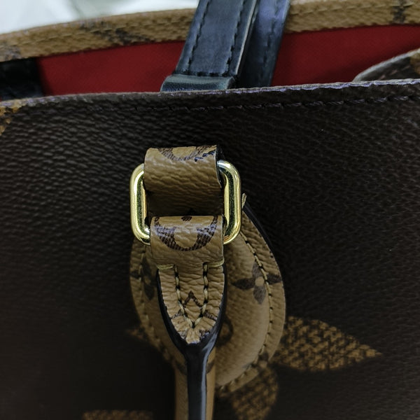 ONTHEGO MM Monogram Coated Canvas Brown