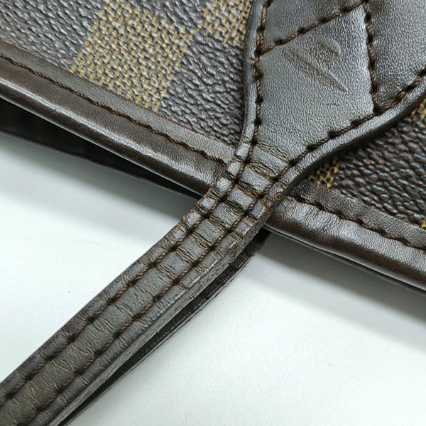 Authenticated pre-owned NEVERFULL MM Damier Ebene Coated Canvas Brown - Tote Bag at Looply
