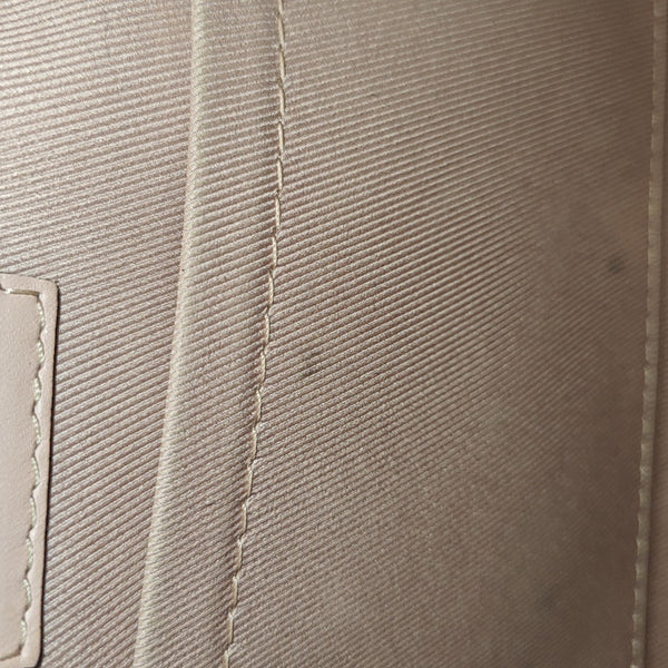 SAINTONGE Monogram Coated Canvas Brown