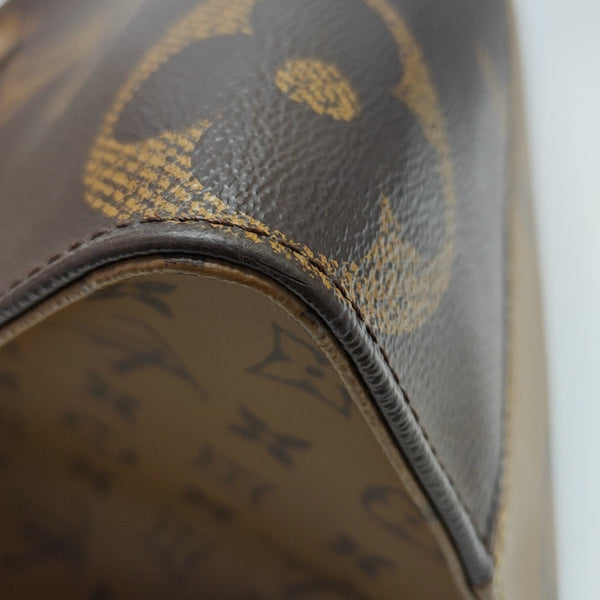 ONTHEGO MM Monogram Coated Canvas Brown