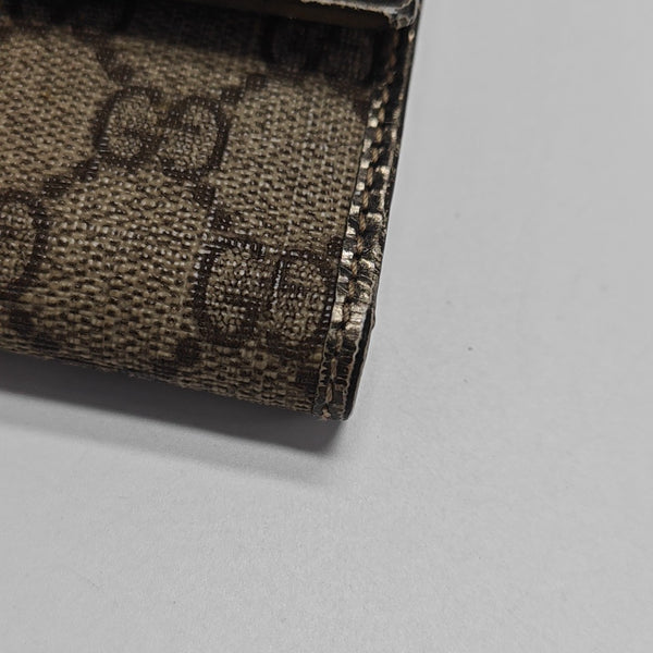 Monogram Coated Canvas Wallet Brown