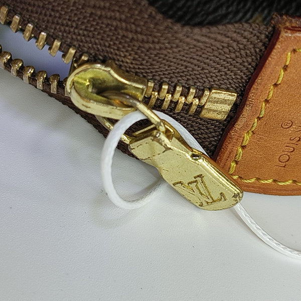 TOILET POCKET 26 Monogram Coated Canvas Brown