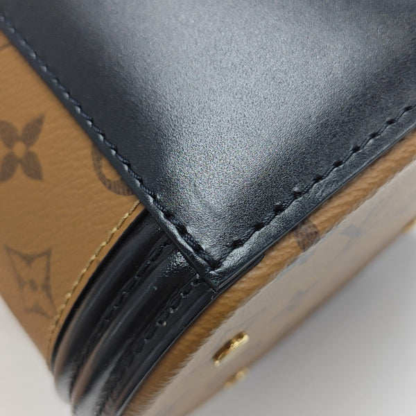 CANNES PM Monogram Coated Canvas Brown