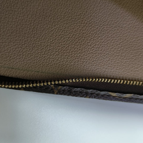 TOILET POCKET 26 Monogram Coated Canvas Brown