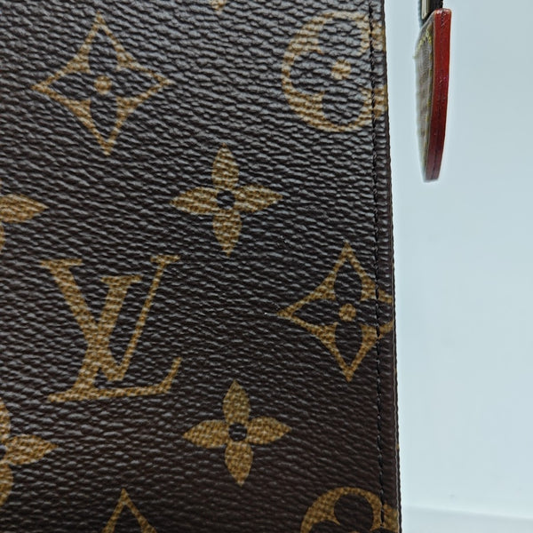 TOILET POCKET 26 Monogram Coated Canvas Brown