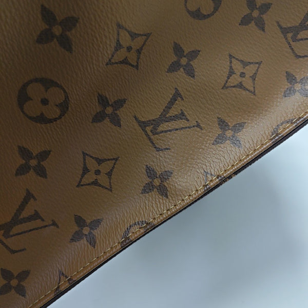 ONTHEGO MM Monogram Coated Canvas Brown