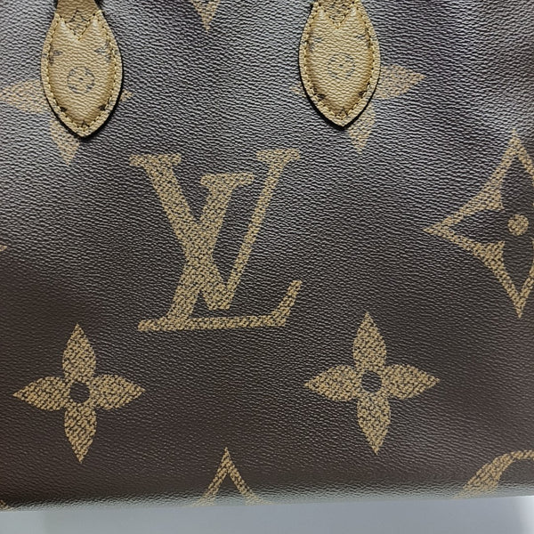 ONTHEGO MM Monogram Coated Canvas Brown