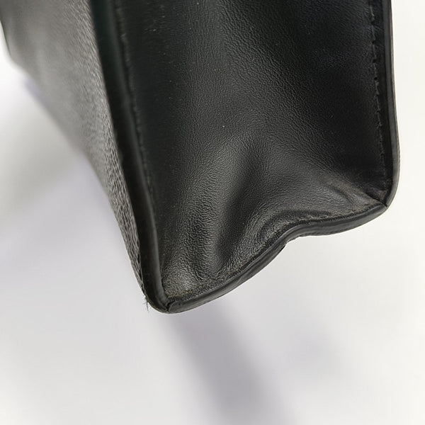 Pochette Voyag MM Monogram Coated Canvas Black