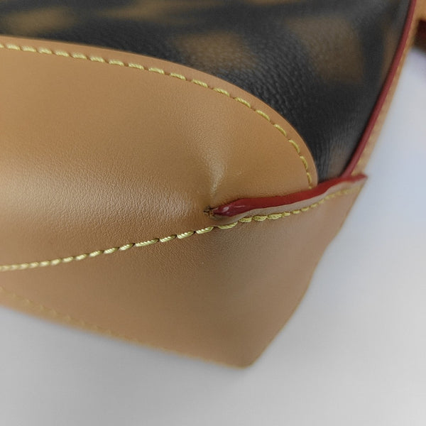 CRUISER Monogram Coated Canvas Brown
