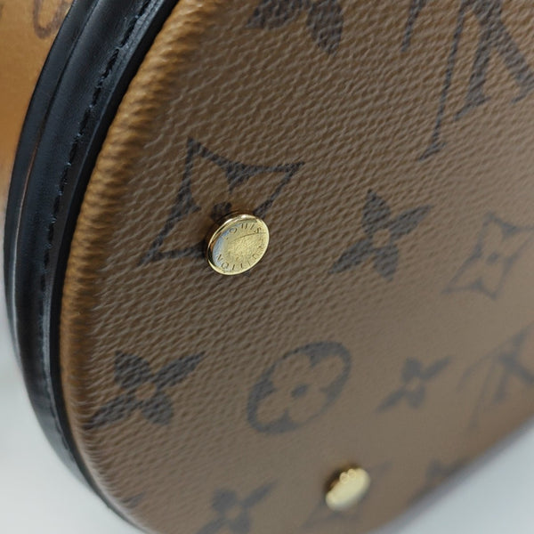 CANNES PM Monogram Coated Canvas Brown