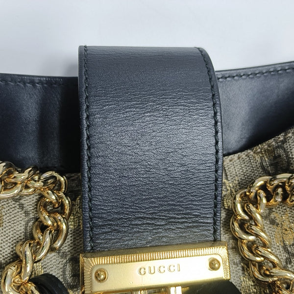Padlock Medium Monogram Coated Canvas Brown