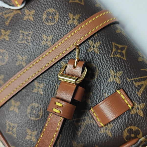 SAUMUR Monogram Coated Canvas Brown