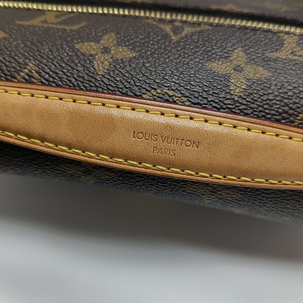 MÉTIS EAST WEST Monogram Coated Canvas Brown