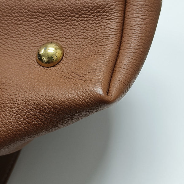 LOW KEY HOBO PM Monogram Calfskin Brown