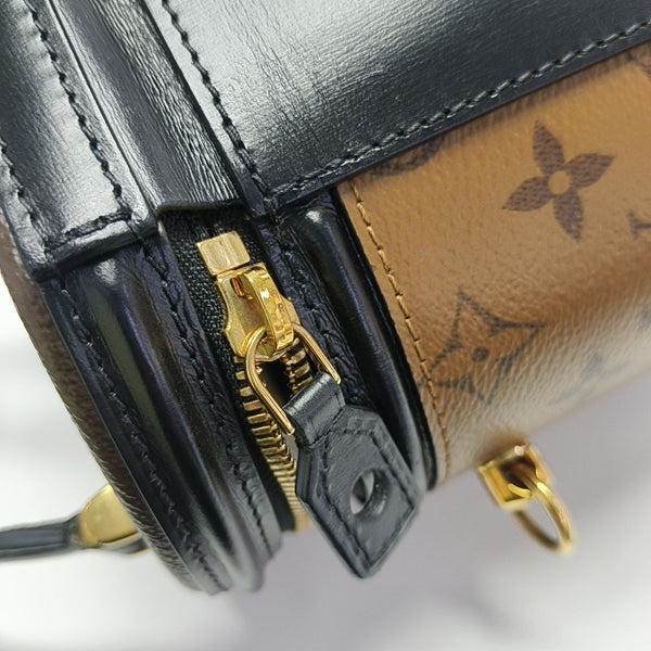 CANNES PM Monogram Coated Canvas Brown