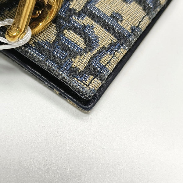 Authenticated pre-owned Saddle Oblique Canvas Blue Wallet - Wallet at Looply