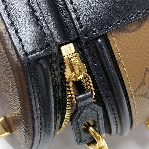 CANNES PM Monogram Coated Canvas Brown