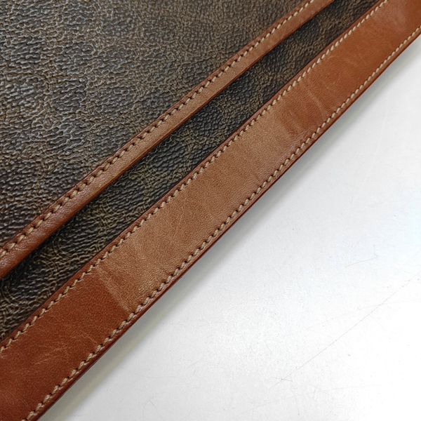 Authenticated pre-owned MACADAM CLUTCHES Coated Canvas Brown - Clutch at Looply